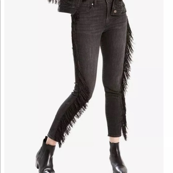 black jeans with fringe on the side